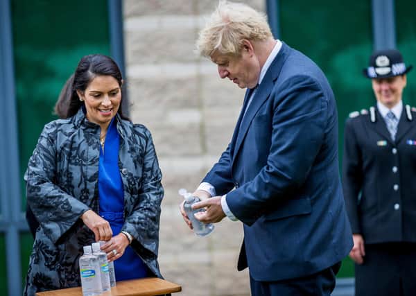 Prime Minster Boris Johnson and Home Secretary Priti Patel in July. Picture: Charlotte Graham