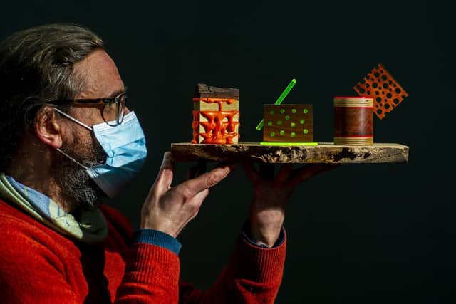Sculptor Jamie Frost based in Holmbridge near Holmfirth has turned his attention to making a range of cakes made from wood and acrylic named 'Patisserie'. Picture by Tony Johnson