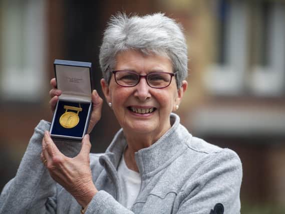 Former nurse Edwina Gerry with her nursing medal.