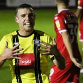 Harrogate Town's Jack Muldoon shows off his painted fingernails after netting against Crawley Town on World Diabetes Day. Picture: Matt Kirkham