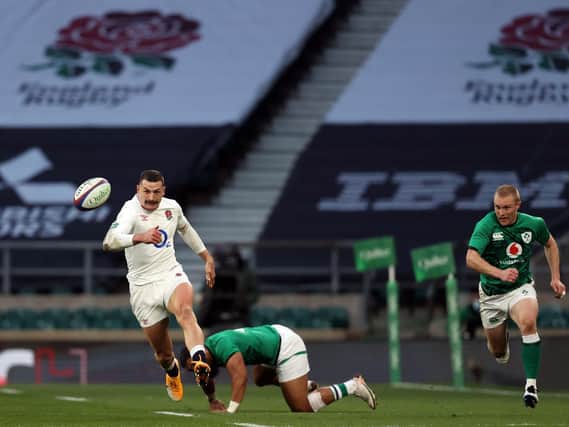 England's Jonny May sets off on the way to his stunning try. (Photo by ADRIAN DENNIS/AFP via Getty Images)