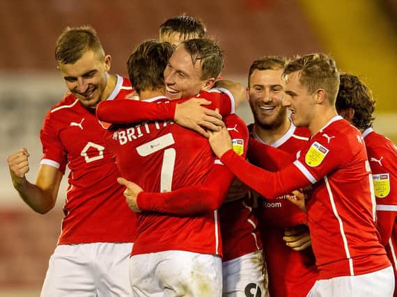 Barnsley players celebrate Callum Styles's opener. Picture: Bruce Rollinson.