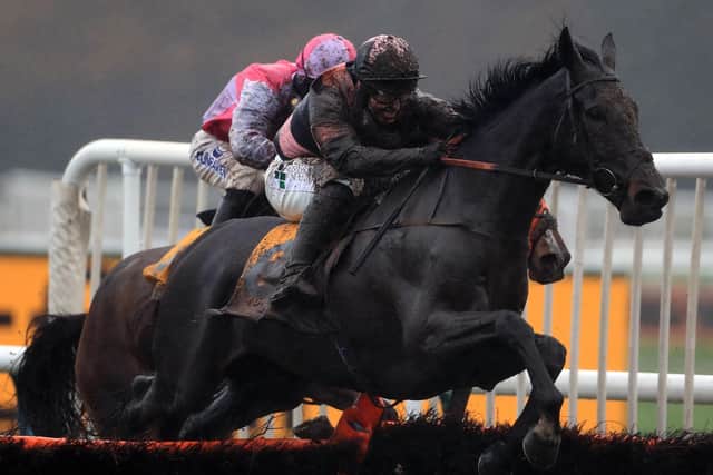 Muddy marvel: A muddy Jonjo O'Neill Jr aboard Third Wind during the Betfair Exchange Stayers' Handicap Hurdle at Haydock Racecourse. Picture: Mike Egerton/PA Wire.