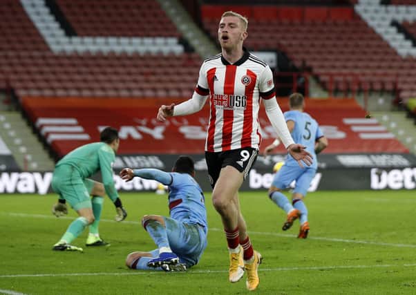 Sheffield United's Oliver McBurnie looks on dejected. Picture: Darren Staples/Sportimage