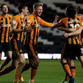 Game over: Hull City's James Scott celebrates scoring his side's third goal. Picture: PA