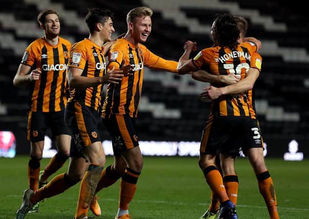 Game over: Hull City's James Scott celebrates scoring his side's third goal. Picture: PA