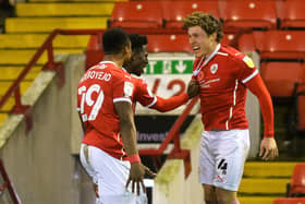 On target: Callum Styles celebrates scoring Barnsley's first goal.  Pictures: Bruce Rollinson