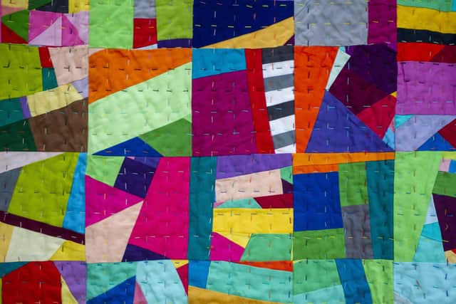 One of Huddersfield quilt maker Chris English's streetwise quilts . Picture Tony Johnson