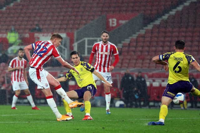 KILLER BLOW: Stoke City's Sam Clucas scores his sides fourth goal against Huddersfield Town at the bet365 Stadium. Picture: Barrington Coombs/PA