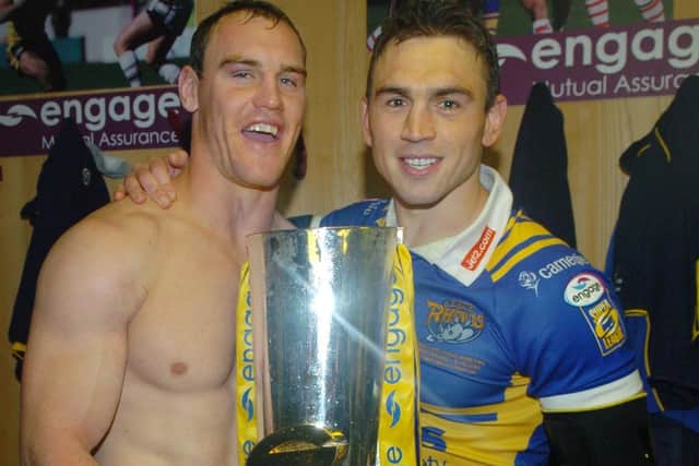 Champions: Ellis and captain Kevin Sinfield celebrate after winning the 2008 Grand Final for Leeds Rhinos.