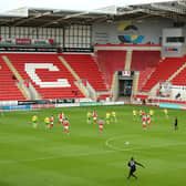 FILLING UP: Rotherham United take on Norwich City at an empty AESSEAL New York Stadium last month. Picture: Nigel French/PA