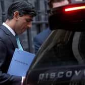 Chancellor Rishi Sunak leaves 11 Downing Street to deliver his spending review.