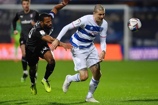 QPR's Lyndon Dykes and Rotherham United's Michael Ihiekwe battle for the ball at Loftus Road on Tuesday night. Picture: Justin Setterfield/Getty Images
