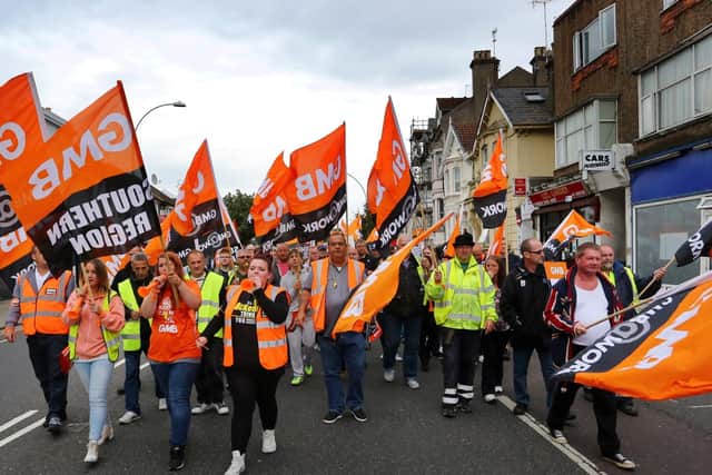 File photo of public sector workers and members of the GMB union making their way through Brighton, during a one-day walkout over bitter disputes over pay, pensions, jobs and spending cuts. Conservative MPs are being warned of consequences at the next general election if they support a freeze on the pay of public-sector workers. Photo: PA