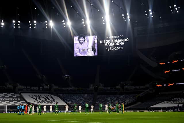 tribute: Tottenham players and officials observe a moment’s silence in memory of Diego Maradona, prior to Thursday night’s Europa League match.  Picture: Dylan Martinez/PA