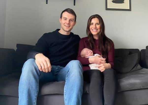 Chris Burns and Emma Bailey with baby Archie