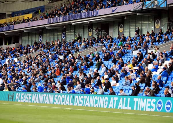 Limited numbers of fans will be allowed back to games in Tier 2 areas from this week - including at Chelsea who are playing Leeds United. In summer, trials of social distanced games were held, including this one at Brighton. Picture: Adam Davy/PA Wire.