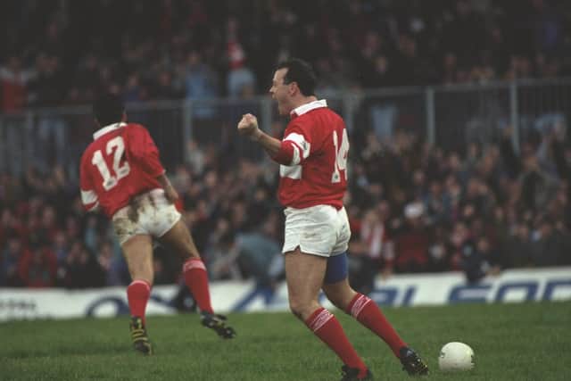 Ieuan Evans (right) of Wales celebrates after scoring a try in the Llanelli v Australia match during the 1992 Australian tour of the British Isles at Strady Park in Llanelli,  Wales. Llanelli won the match 13-9.  (Picture: Allsport UK /Getty Images)