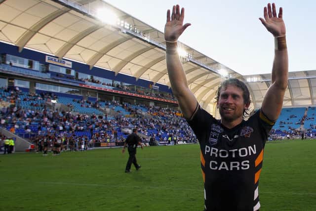 Brett Hodgson of Wests Tigers farewells fans after the round 26 NRL match between the Gold Coast Titans and the Wests Tigers held at Skilled Stadium on September 7, 2008 in Robina, Australia.  (Picture: Bradley Kanaris/Getty Images)
