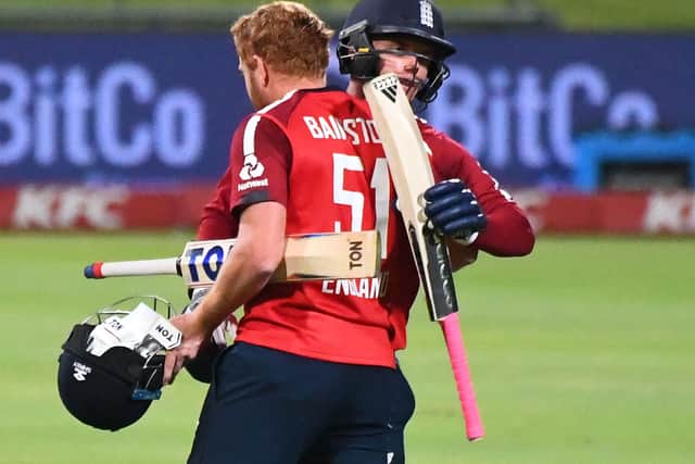 England's Sam Curran (R) and England's Jonny Bairstow (L) celebrates after their victory over South Africa (Picture RODGER BOSCH/AFP via Getty Images)