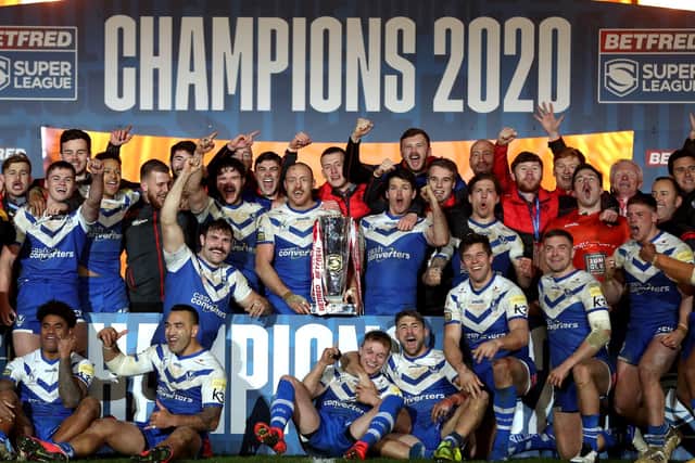St Helens celebrate with the trophy after winning the Betfred Super League Grand Final at the KCOM Stadium, Hull (Picture: PA)