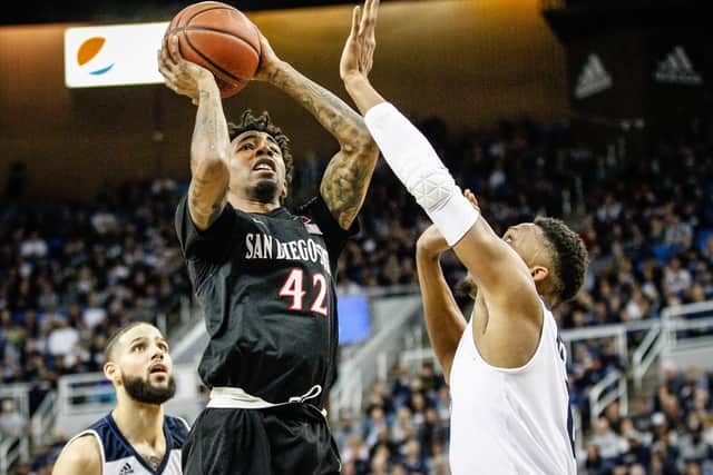 Tre'Shawn Thurman #0 of the Nevada Wolf Pack jumps to block a shot by Jeremy Hemsley #42 of the San Diego State Aztecs . (Picture: Jonathan Devich/Getty Images)