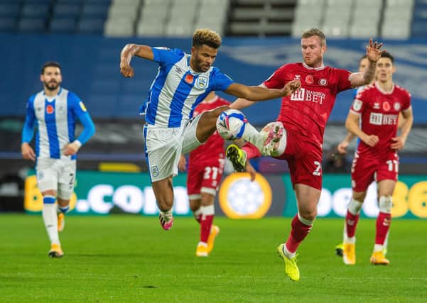 Friendly foes: Huddersfield Town striker Frazier Campbell is looking forward to renewing acquaintances with his old manager, Middlesbrough’s  Neil Warnock. Picture Bruce Rollinson