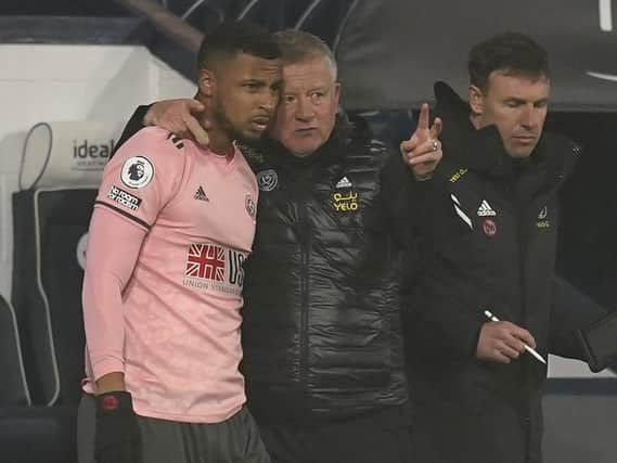 FRUSTRATION: Chris Wilder gives instructions to Lys Mousset, who made his first appearance from the bench after recovering from a toe operation