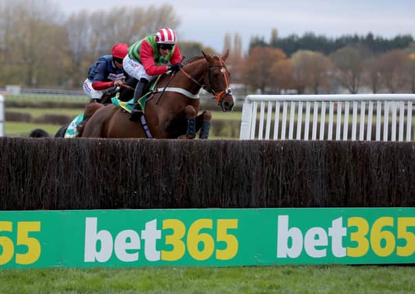 This was Danny CVook winning the 2018 Charlie Hall Chase under Danny Cook.