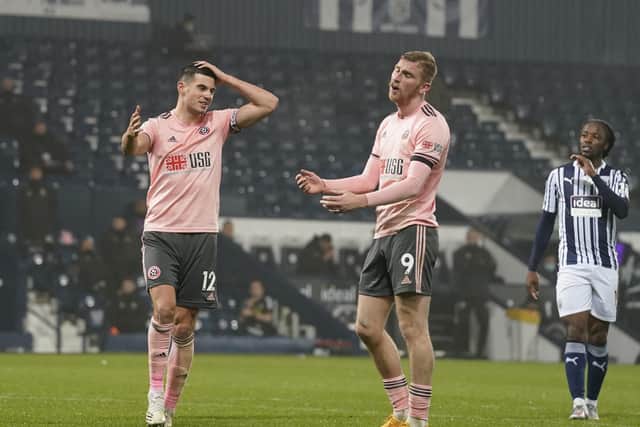 FRUSTRATION: Sheffield United's for John Egan and Oli McBurnie react after another chance goes begging at The Hawthorns. Picture: Andrew Yates/Sportimage