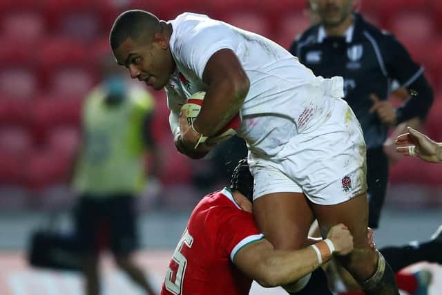 Driving force: Kyle Sinckler of England is tackled by Leigh Halfpenny. (Photo by Michael Steele/Getty Images)