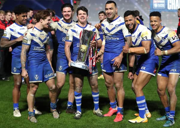 St Helens celebrate with the trophy after winning the Betfred Super League Grand Final at the KCOM Stadium, Hull. PA (Picture: Martin Rickett/PA Wire)