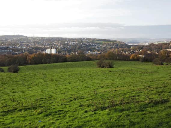 Fields off Thornhills Lane, Clifton, with Brighouse in the background.