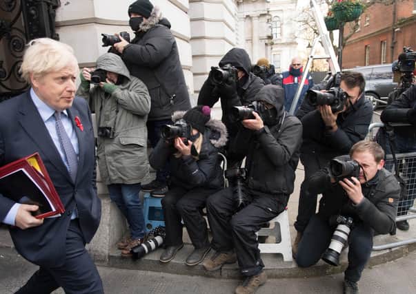 Boris Johnson returns to 10 Downing Street after a meeting of the Cabinet on Tuesday.