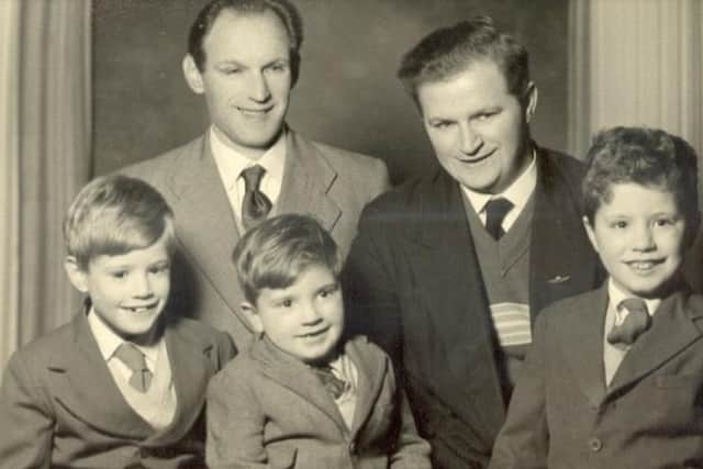 Henry Carr (top right) with his brother Nathan and three of his sons, including John (bottom right)