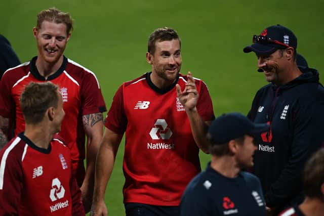 LEADING MAN: Dawid Malan explains how he won a second successive man of the match award to his England team-mates at Newlands. Picture: Shaun Botterill/Getty Images
