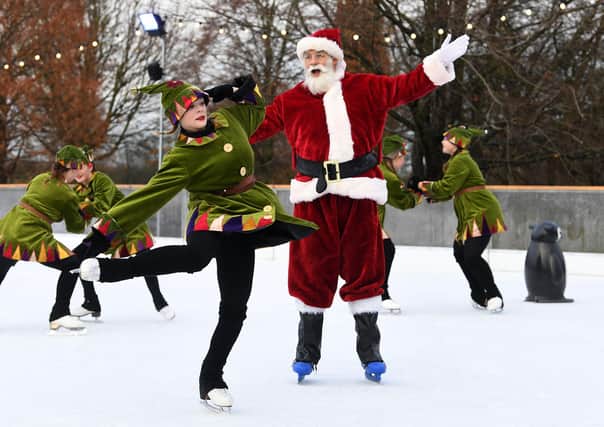 Father Christmas and his elves take to the ice at the Lotherton Hall Christmas Experience in 2019. While things will be slightly different this year due to Covid, Father Christmas will still be paying a visit. Picture: Jonathan Gawthorpe