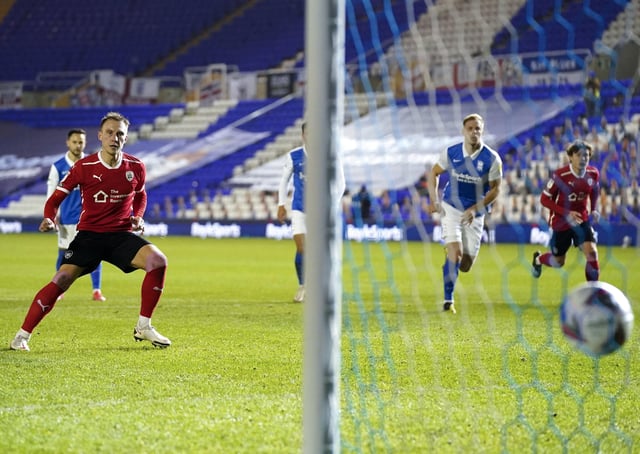 Barnsley's Cauley Woodrow scores his side's first goal of the game from the penalty spot against Birmingham. Picture: PA