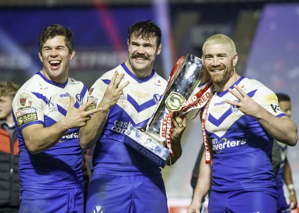 Three-time winners: St Helens trio, from left, Louie McCarthy-Scarsbrook, Alex Walmsley and Kyle Amor. Picture: SWPix