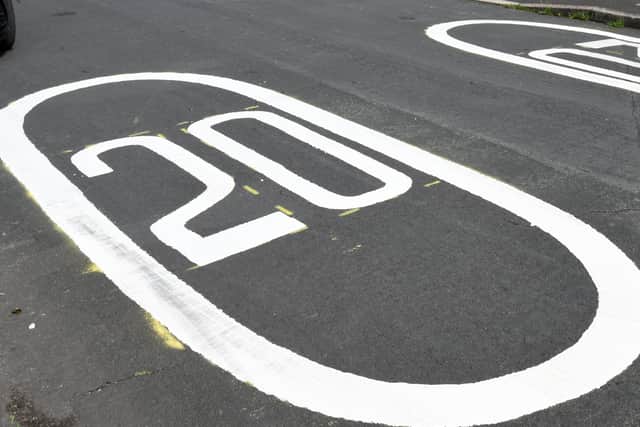 What should be the speed limit outside schools?
