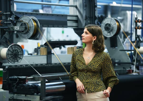 Jewellery designer Megan Brown, great great granddaugher of the founder of Alfred Brown, with her woven designs in the family weavers mill in Bramley.
Picture: Jonathan Gawthorpe