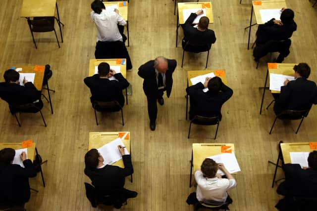 Should pupils still have to sit GCSE and A-Level exams next year? Photo: David Jones/PA Wire