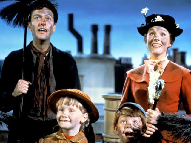Dick Van Dyke as Bert, Julie Andrews as Mary Poppins, Karen Dotrice as Jane Banks and Matthew Garber (1956 - 1977) as Michael Banks in the Disney musical Mary Poppins, from 1964. ( Silver Screen Collection/Hulton Archive/Getty Images).