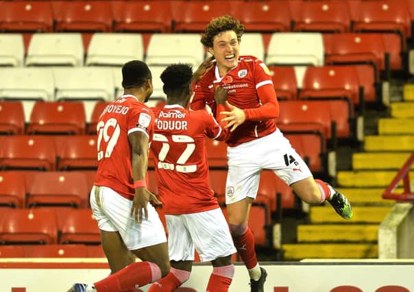 Rising stars: Callum Styles, right, celebrates his goal against Nottingham Forest last month. Whether Barnsley can hold on to him in Janaury will be key. (Picture: Bruce Rollinson)