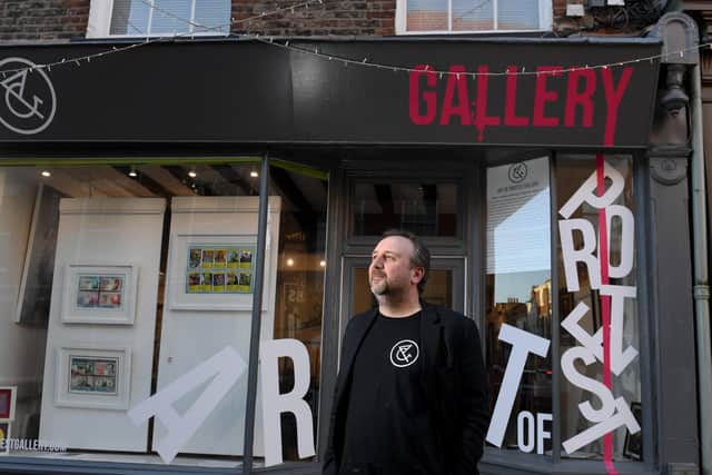 Craig Humble outside his store The Art of Protest