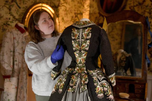 Rachel Wallis, assistant curator at Fairfax House in York, arranging the 18th Century costumes given by anonymous donors. Picture: Gary Longbottom.