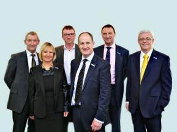 Kevin Hollinrake (front, centre) and the board of directors at Hunters Property