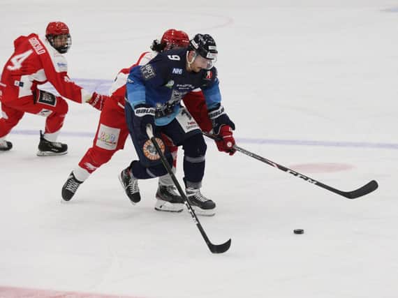 Sheffield Steeldogs' Ben Lake battles for possession against Swindon Wildcats in the recent Streaming Series. Picture: Cerys Molloy