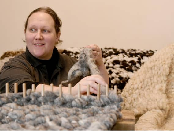 After wool prices fell Laura turned her fleeces into rugs