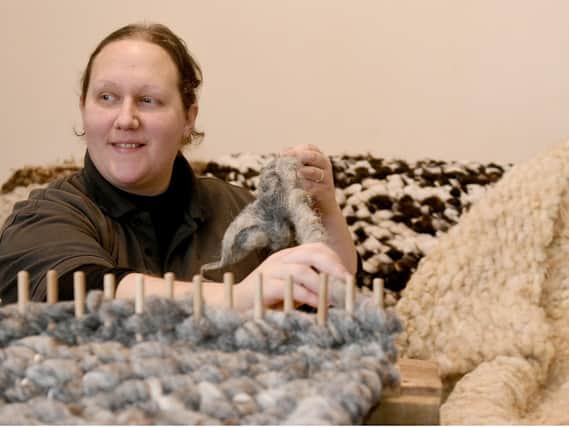 After wool prices fell Laura turned her fleeces into rugs